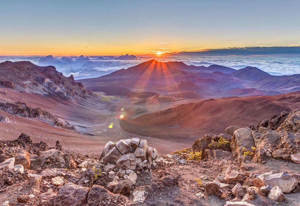 sunrise from the summit of Haleakala volcano on the tropical island of Maui, Hawaii
