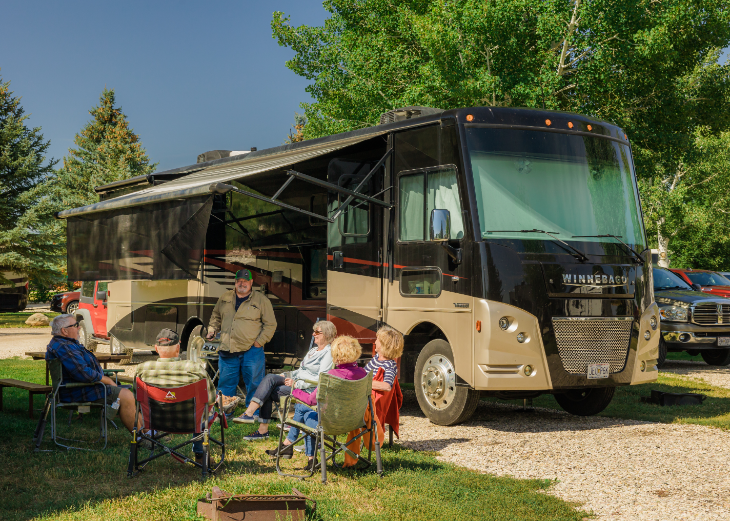 family camping outisde of RV